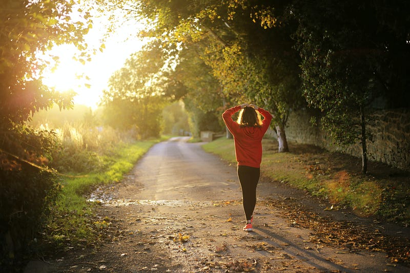 Woman enjoying a peaceful morning walk