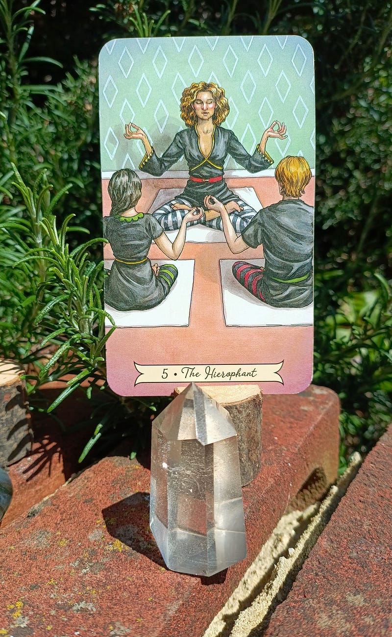 The Hierophant Tarot card from Everyday Witch with a clear quartz point