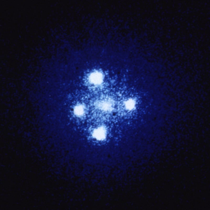 The Einstein Cross illustrating gravitational lensing