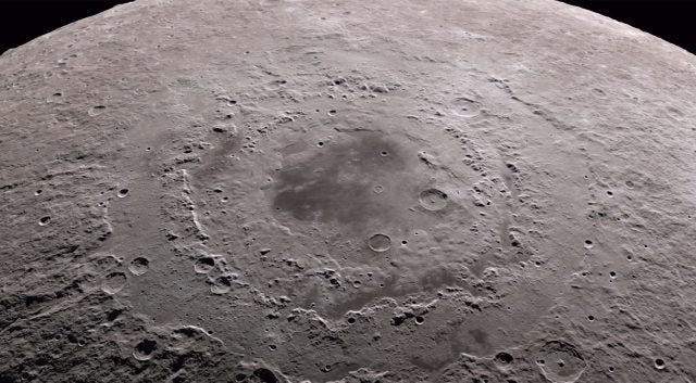 Analysis of lunar craters revealing metal concentrations