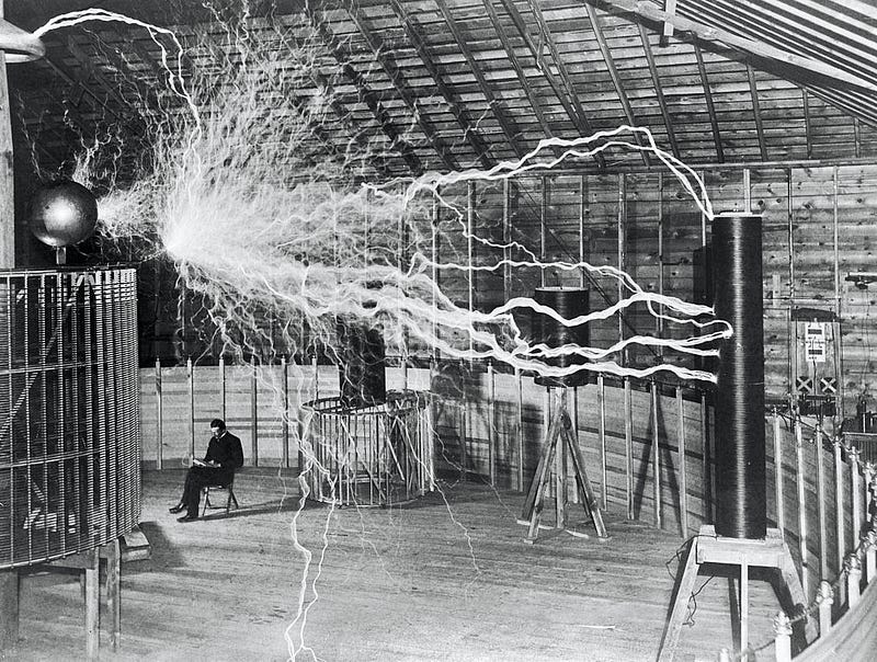 Tesla in his lab | Image Source: Wikimedia Commons (Creative Commons Attribution-Share Alike 4.0 International)