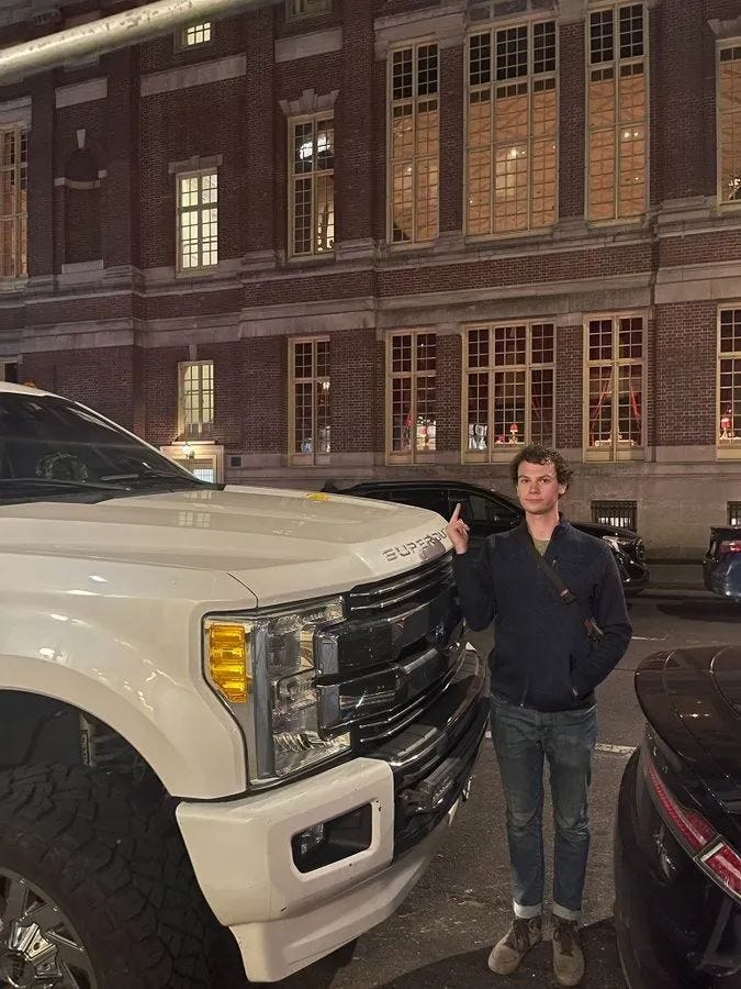 Man next to Ford F-350 pickup truck