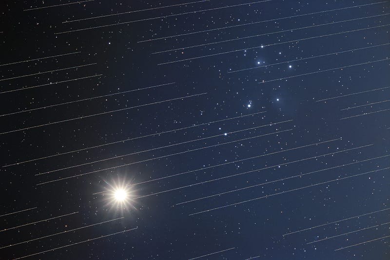 Starlink satellites crossing the sky.